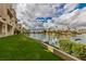 Stunning view of lake, landscaping, and homes at 10080 E Mountain View Lake Dr # 140, Scottsdale, AZ 85258