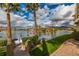 Scenic waterfront view with boat slips and palm trees at 10080 E Mountain View Lake Dr # 140, Scottsdale, AZ 85258