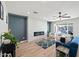 Living room featuring a modern fireplace and ample natural light at 1010 E Indianola Ave, Phoenix, AZ 85014