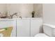 Bathroom with a large vanity, bathtub, and toilet at 10518 W Oakmont Dr, Sun City, AZ 85351