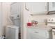 Stackable washer and dryer in a well-lit space at 10518 W Oakmont Dr, Sun City, AZ 85351