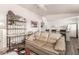 Light beige couch in living room with kitchen view at 10518 W Oakmont Dr, Sun City, AZ 85351