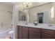 Bathroom boasts double vanity and a shower/tub combo at 1059 W Caroline Ln, Tempe, AZ 85284