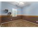 Bedroom with light blue walls and brown accents at 1059 W Caroline Ln, Tempe, AZ 85284