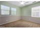 Bright bedroom with neutral walls and carpet at 1059 W Caroline Ln, Tempe, AZ 85284