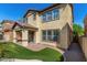 Two-story house with a covered patio and grassy backyard at 1059 W Caroline Ln, Tempe, AZ 85284