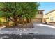 Two-story house with stone accents and a two-car garage at 1059 W Caroline Ln, Tempe, AZ 85284