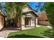 Two-story house with covered patio and grassy backyard at 1059 W Caroline Ln, Tempe, AZ 85284