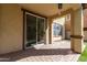 Covered patio with sliding glass door access at 1059 W Caroline Ln, Tempe, AZ 85284