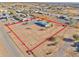 Aerial view of a manufactured home on a large lot with desert landscape at 10991 W Hilltop Dr, Casa Grande, AZ 85193