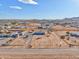 Aerial view of a single-Gathering home with a large yard at 10991 W Hilltop Dr, Casa Grande, AZ 85193