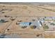 Aerial view of a manufactured home on a spacious lot near a highway at 10991 W Hilltop Dr, Casa Grande, AZ 85193