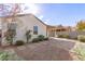 Landscaped backyard with flagstone patio at 1154 W Lowell Dr, San Tan Valley, AZ 85140