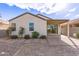 Landscaped backyard with flagstone patio at 1154 W Lowell Dr, San Tan Valley, AZ 85140