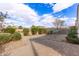 Landscaped backyard with flagstone patio at 1154 W Lowell Dr, San Tan Valley, AZ 85140