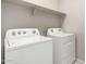 Laundry room with Whirlpool washer and dryer at 1154 W Lowell Dr, San Tan Valley, AZ 85140