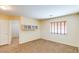 Bedroom with window, closet and built-in shelves at 12503 S 175Th Ave, Goodyear, AZ 85338