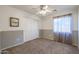 Spacious bedroom with ceiling fan and double door closet at 12503 S 175Th Ave, Goodyear, AZ 85338