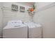 Laundry room with washer, dryer and shelving at 12503 S 175Th Ave, Goodyear, AZ 85338