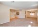 Spacious living room with vaulted ceilings and carpet flooring at 12503 S 175Th Ave, Goodyear, AZ 85338