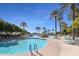 Relaxing pool area with lounge chairs and palm trees at 12503 S 175Th Ave, Goodyear, AZ 85338