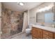 Updated bathroom with walk-in shower and vanity at 12619 N Sun Valley Dr, Sun City, AZ 85351