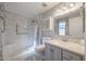 Updated bathroom with walk-in shower and new vanity at 12619 N Sun Valley Dr, Sun City, AZ 85351