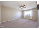 Well lit bedroom with carpet and ceiling fan at 12619 N Sun Valley Dr, Sun City, AZ 85351