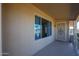 Covered front porch with tiled flooring and security door at 12619 N Sun Valley Dr, Sun City, AZ 85351