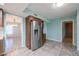 Kitchen features stainless steel refrigerator and wood cabinets at 12619 N Sun Valley Dr, Sun City, AZ 85351