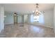 Bright and airy living room with tile flooring and a ceiling fan at 12619 N Sun Valley Dr, Sun City, AZ 85351