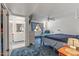 Bedroom with ensuite bathroom and ceiling fan at 12630 W Crystal Lake Dr, Sun City West, AZ 85375