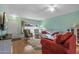 Living room with light walls, hardwood floors, and comfortable seating at 12630 W Crystal Lake Dr, Sun City West, AZ 85375