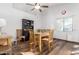 Simple dining area with a small table and four chairs, offering a cozy space for meals at 12907 W Sharon Dr, El Mirage, AZ 85335