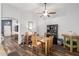 Bright dining room features a wooden table with four chairs and a built-in hutch at 12907 W Sharon Dr, El Mirage, AZ 85335