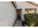 Front door entry with walkway and landscaping at 12907 W Sharon Dr, El Mirage, AZ 85335