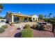 Landscaped backyard with pool, patio, and a golf course view at 13105 W Micheltorena Dr, Sun City West, AZ 85375