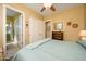 Spacious bedroom with ensuite bathroom access at 13105 W Micheltorena Dr, Sun City West, AZ 85375