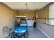 Garage with golf cart and storage cabinets at 13105 W Micheltorena Dr, Sun City West, AZ 85375