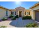 Beautiful house exterior with stone accents and landscaping at 13105 W Micheltorena Dr, Sun City West, AZ 85375