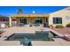 Private pool and patio area with seating and a grill at 13105 W Micheltorena Dr, Sun City West, AZ 85375