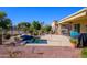 Private pool with patio and a golf course view at 13105 W Micheltorena Dr, Sun City West, AZ 85375