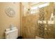 Shower stall with glass enclosure and tile surround at 13105 W Micheltorena Dr, Sun City West, AZ 85375