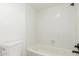 Clean bathroom with white tile and bathtub at 14203 N 19Th Ave # 1051, Phoenix, AZ 85023