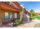 Condo entrance with private balcony and landscaping at 14203 N 19Th Ave # 1051, Phoenix, AZ 85023