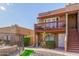 Condo entrance with private balcony and stairs leading up at 14203 N 19Th Ave # 1051, Phoenix, AZ 85023