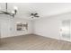 Spacious living area with wood-look floors and lots of light at 14203 N 19Th Ave # 1051, Phoenix, AZ 85023