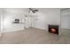 Bright living room with a fireplace and wood-look floors at 14203 N 19Th Ave # 1051, Phoenix, AZ 85023