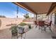 Covered patio with seating area and desert landscaping at 1486 E Augusta Ave, Chandler, AZ 85249