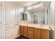 Bathroom features double vanity, wood cabinets and a shower at 1486 E Augusta Ave, Chandler, AZ 85249